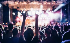 Fans attend a concert.